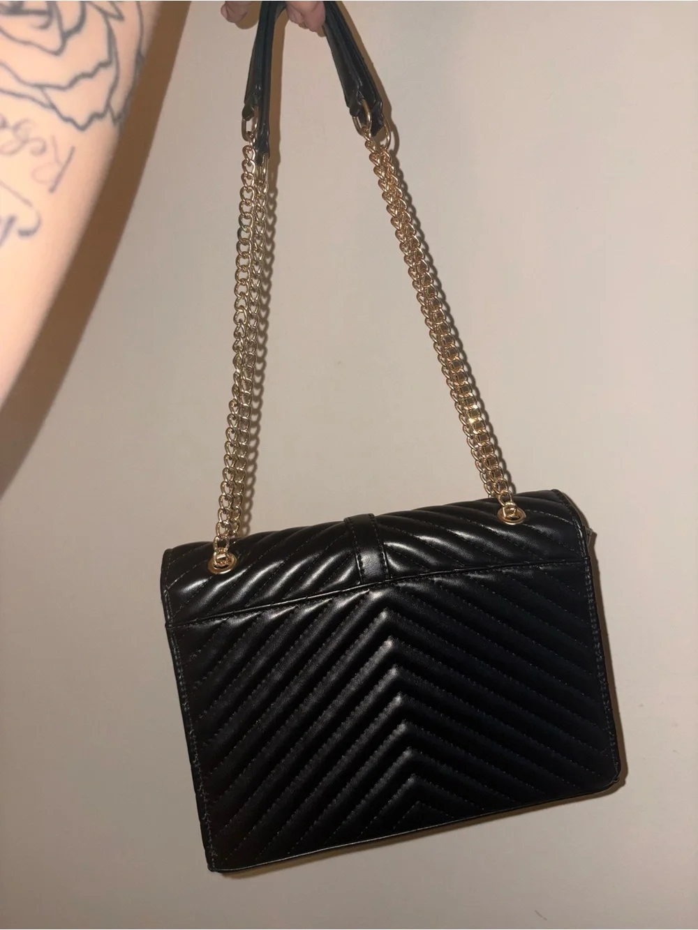 Black Quilted Shoulder Bag with Gold Chain and Logo Hardware